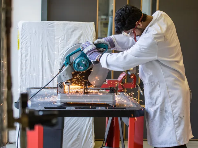 student using circular saw