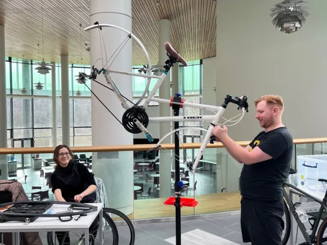 Two people at a Bike Maintenance event in the Sir Ian Wood Building
