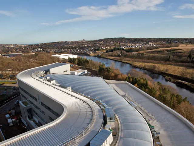 roof of sir ian wood building with landscape in the background