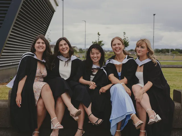 Graduates in gowns and hats