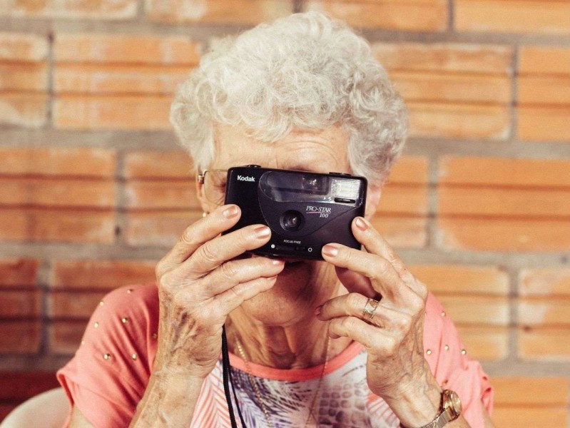 Pensioner with a camera