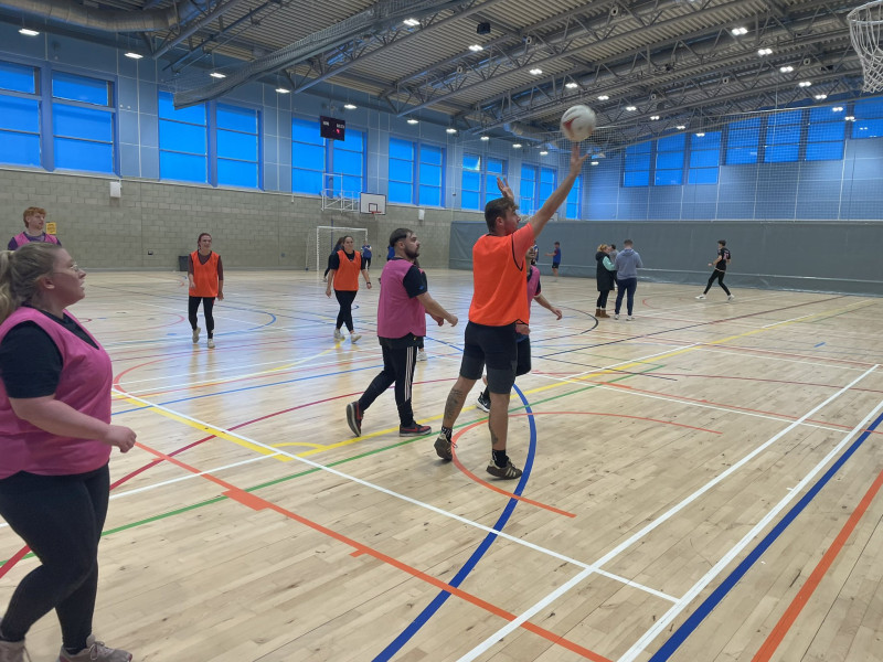 Students playing basketball