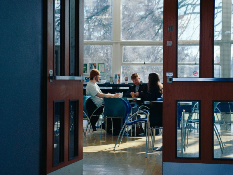 Three RGU students talking together