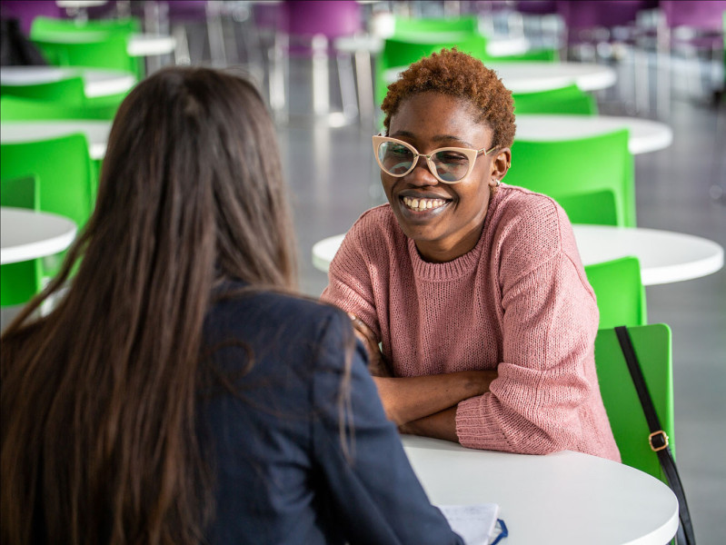 students smiling on campus