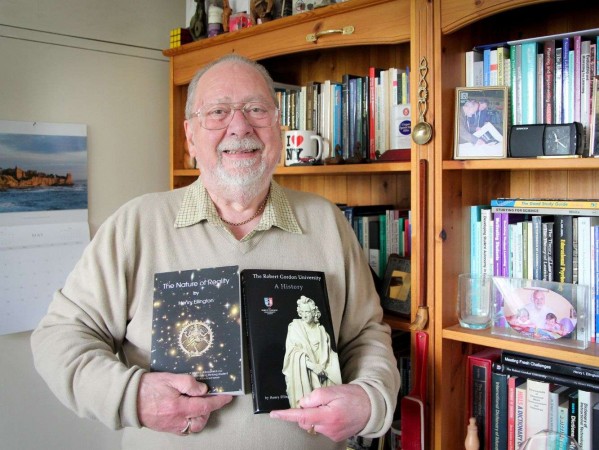 Emeritus Professor Henry Ellington, OBE, BSc, PhD, DLitt, CPhys, FInstP. Holding ‘History of RGU’ written after retiring in 2001, and ‘The Nature of Reality’ written 18 years later during the COVID lockdown