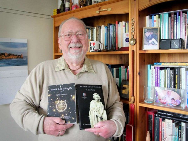 Emeritus Professor Henry Ellington, OBE, BSc, PhD, DLitt, CPhys, FInstP. Holding ‘History of RGU’ written after retiring in 2001, and ‘The Nature of Reality’ written 18 years later during the COVID lockdown Emeritus Professor Henry Ellington, OBE, BSc, PhD, DLitt, CPhys, FInstP. Holding ‘History of RGU’ written after retiring in 2001, and ‘The Nature of Reality’ written 18 years later during the COVID lockdown