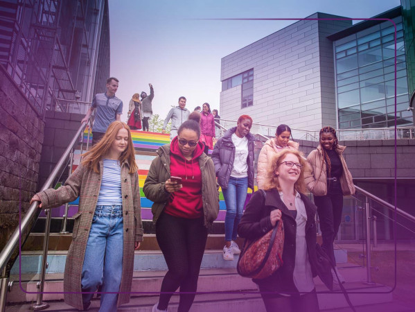 Students on the Rainbow Steps on Campus