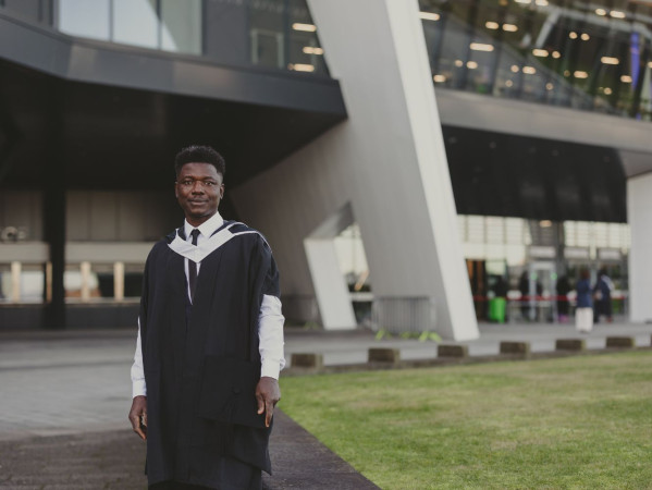 David Kaye in graduation robes at P&J Live