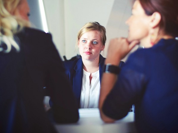 woman in a suit during a meeting
