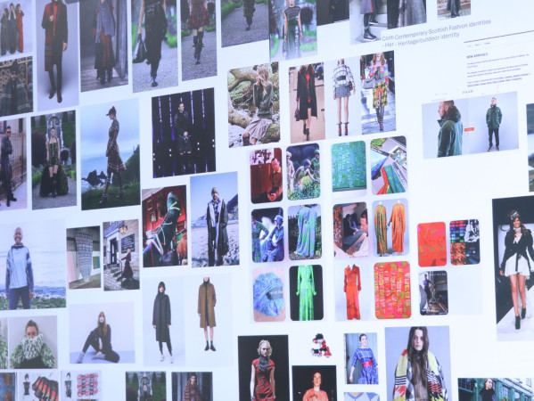 Image shows digital screen with fashion images Image shows digital screen with fashion images