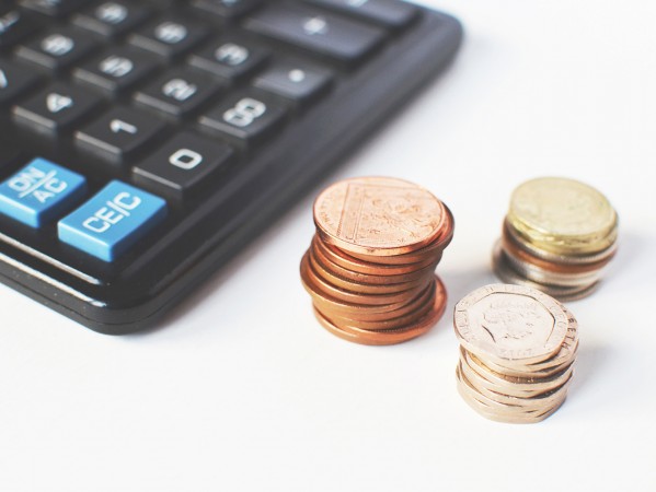 calculator and coins