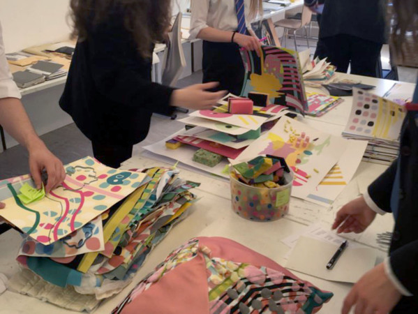 School pupils looking at artwork during a workshop at Gray's School of Art