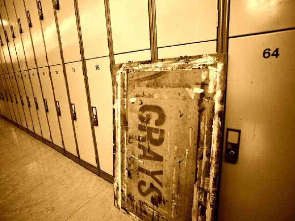 Sepia filtered image of a corridor of lockers and an art board with 'Grays' printed on it Sepia filtered image of a corridor of lockers and an art board with 'Grays' printed on it