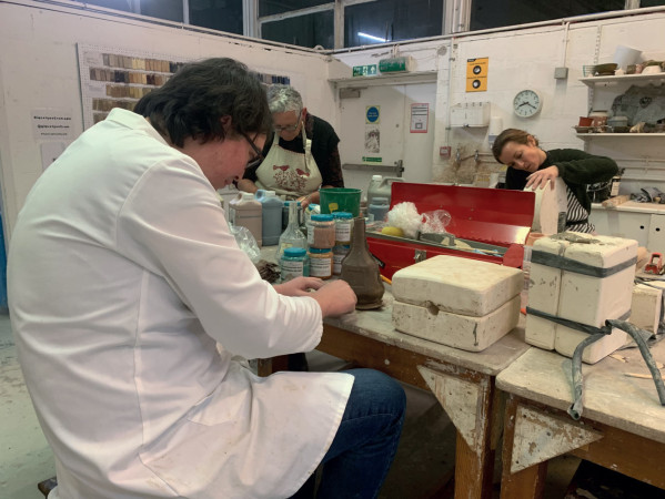 people using plaster molds