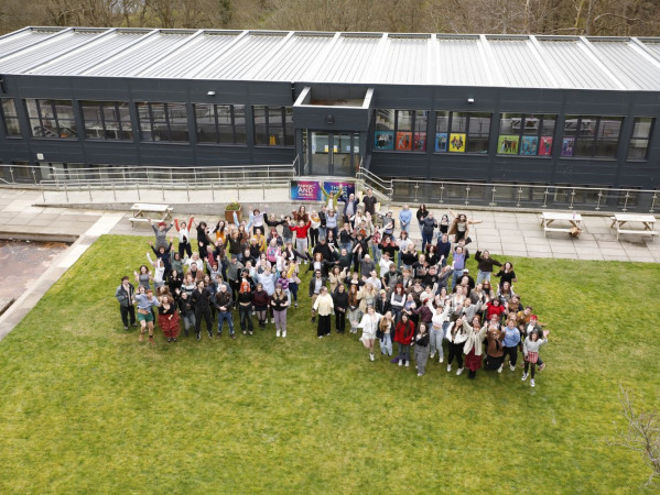 Image shows aerial photo of a group of Gray's School of Art students outside Gray's School of Art's Design Haus