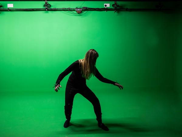 student using the green screen facility