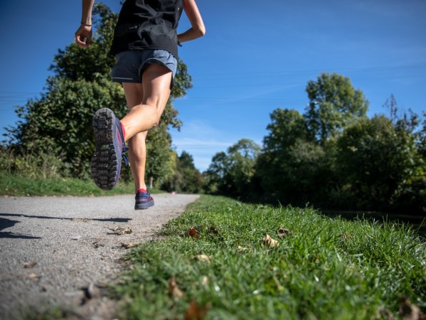 person running through a park