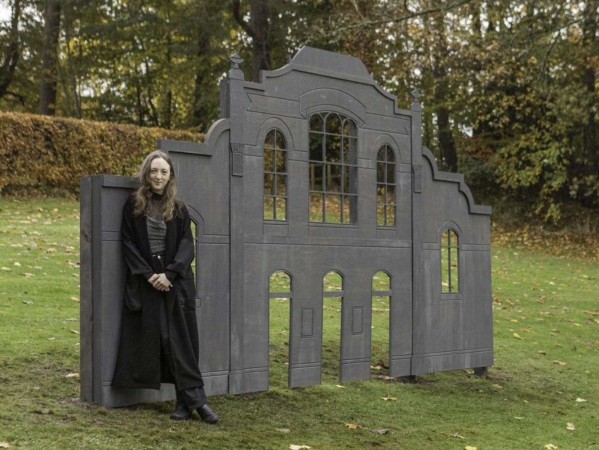 Iris Walker-Reid, MA Fine Art graduate with a giant sculpture 'The Palace of Facade'