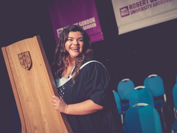 Kirstin steps out from behind-the-scenes of organising graduation ceremonies to collect her own master's degree