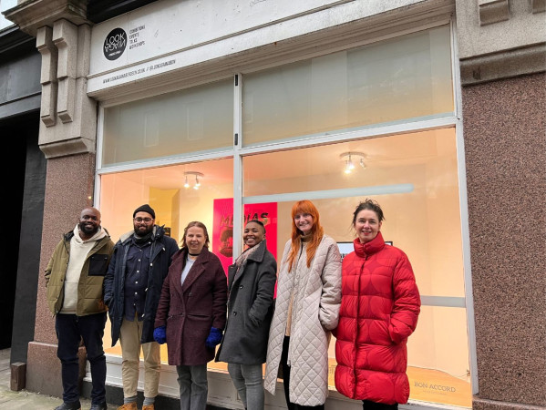 Image shows We Are Here Scotland Director, Ica Headlam, artists Rudy Kanhye, Helen Love, Helen Noon, and Claire Bruce and Hilary Nicoll from Look Again.