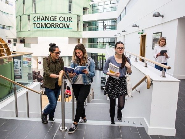 students walking up the stairs of the Sir Ian Wood Building