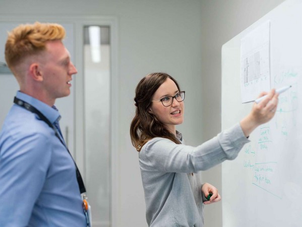 Female engineer taking a presentation