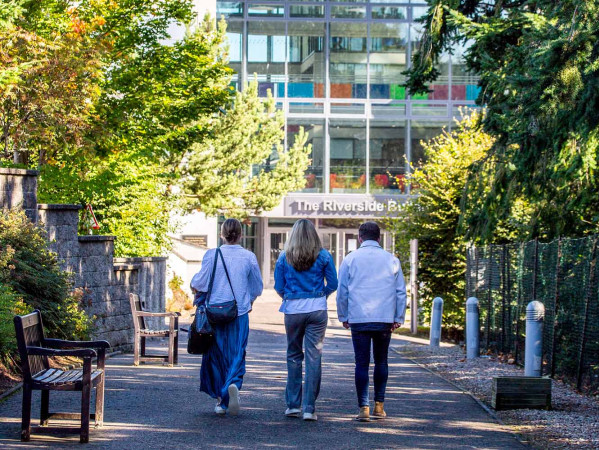 people walking on campus
