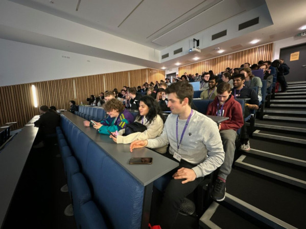 Students with laptops taking part in the RGU Hack event