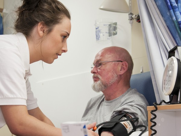 two people in a hospital setting