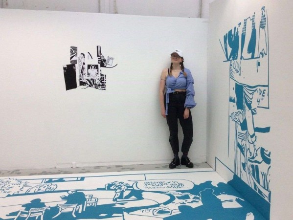 Image of Scarlett Keiller with artwork from her project 'Lost in Translation' Image of Scarlett Keiller with artwork from her project 'Lost in Translation'