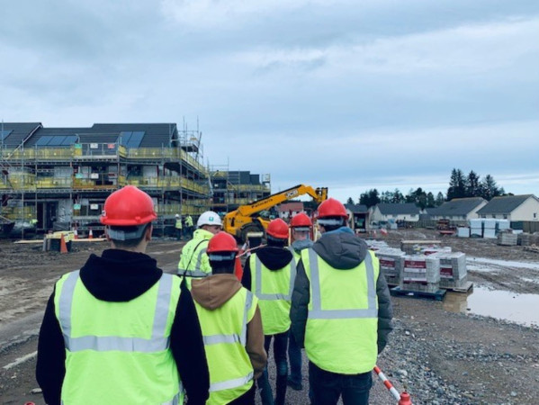 Image shows students from Scott Sutherland School visiting a Cala Homes Building site in Milltimber, Aberdeen