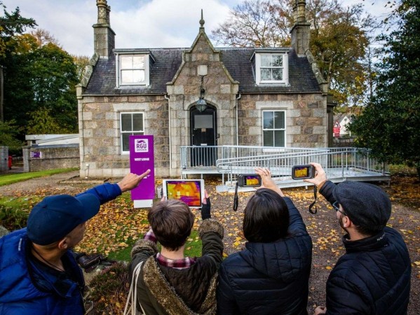 Image shows a team from The Scott Sutherland School of Architecture & Built Environment taking thermal images of an old property on RGU campus