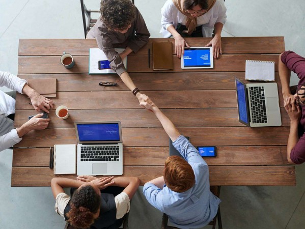 people working round a table