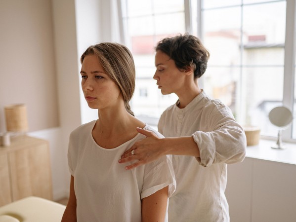 Health practitioner with patient