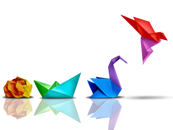 illustration of paper folding progression from ball to flying bird