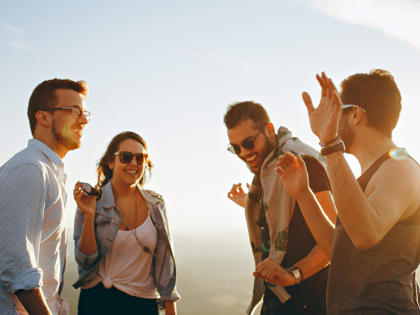 People talking with sunlight behind them