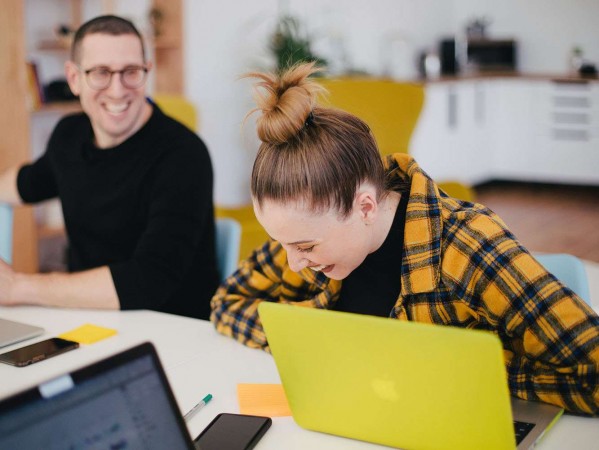 laughing woman in a meeting