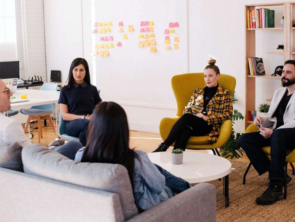 people sitting in a meeting