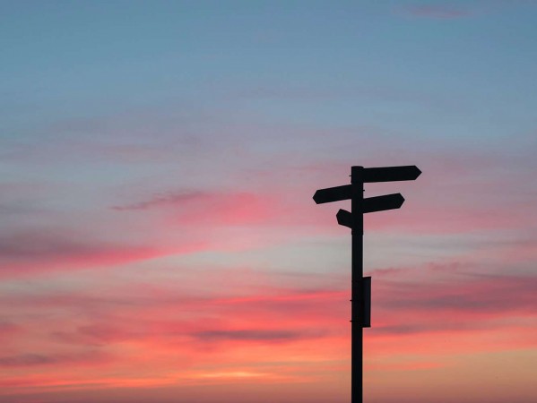 signpost in the sunset