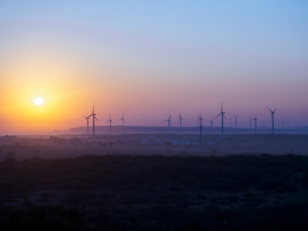 wind turbines at sunset