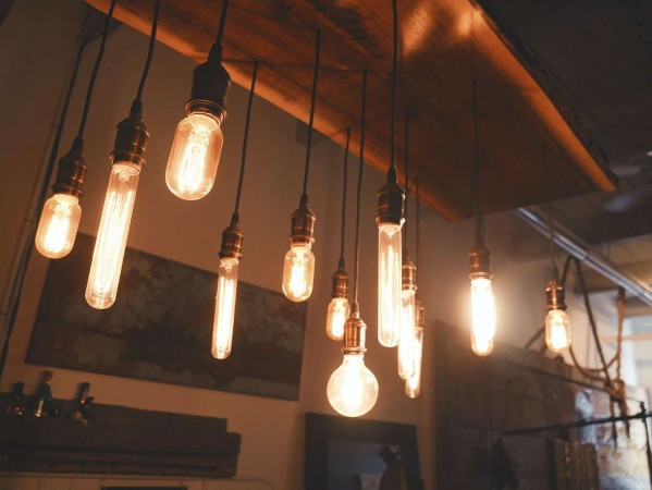 lightbulbs hanging from a dark ceiling