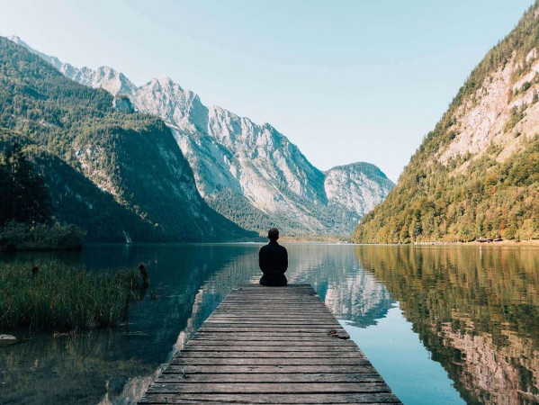 person on a pier in landscape