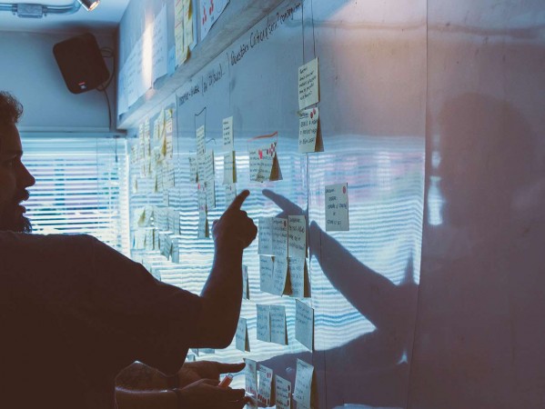 person by a whiteboard person by a whiteboard